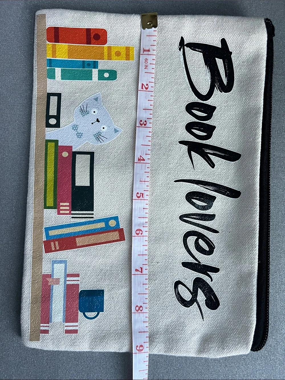 Book Lovers Canvas Zipper Pouch with Colorful Book Print Size 9” L x 6.5” W